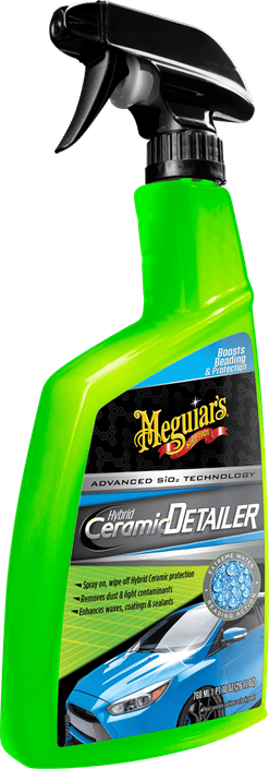 Grön sprayflaska med svart etikett. Blank bil på flaskan. Meguiars.
